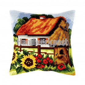 kruissteekkussen boerderij met bloemenpracht