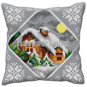 kruissteekkussen huis in wintersfeer