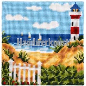 kruissteekkussen strandgezicht met vuurtoren