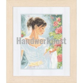 borduurpakket dame bij rode bloemen