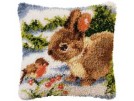 knoopkussen konijn met roodborstje