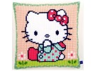 kruissteekkussen hello kitty, in het gras